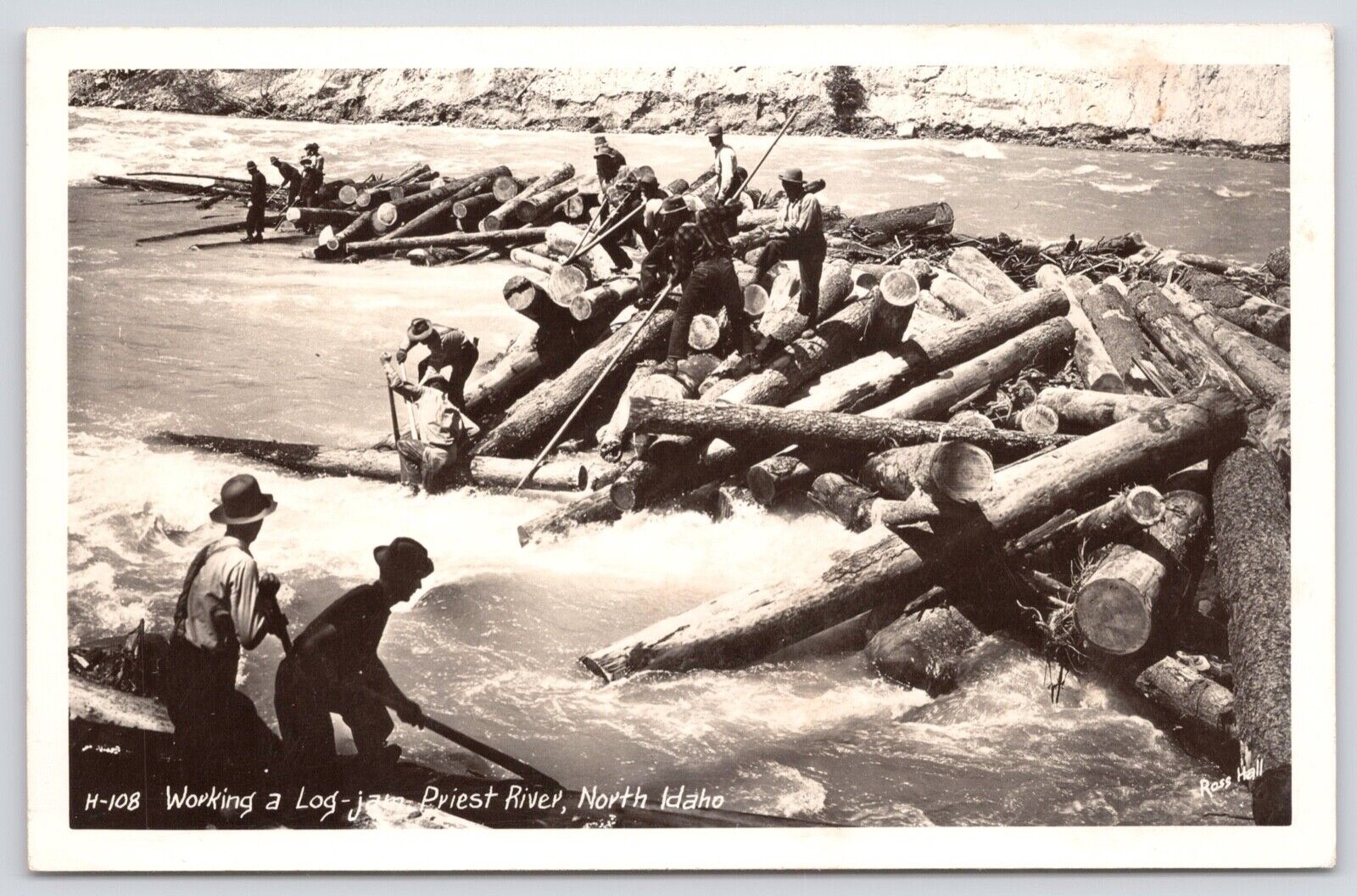 Postcard RPPC Men \'Working a Log-Jam\' on the Priest River in North Idaho c1940s