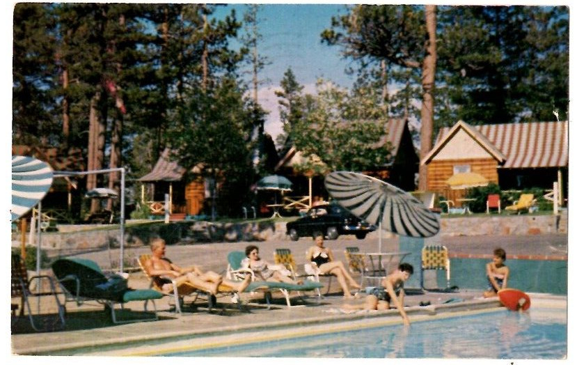 1966 Postcard Shangri-la Village Big Bear Lake CA Swimming Pool Umbrells Cabins