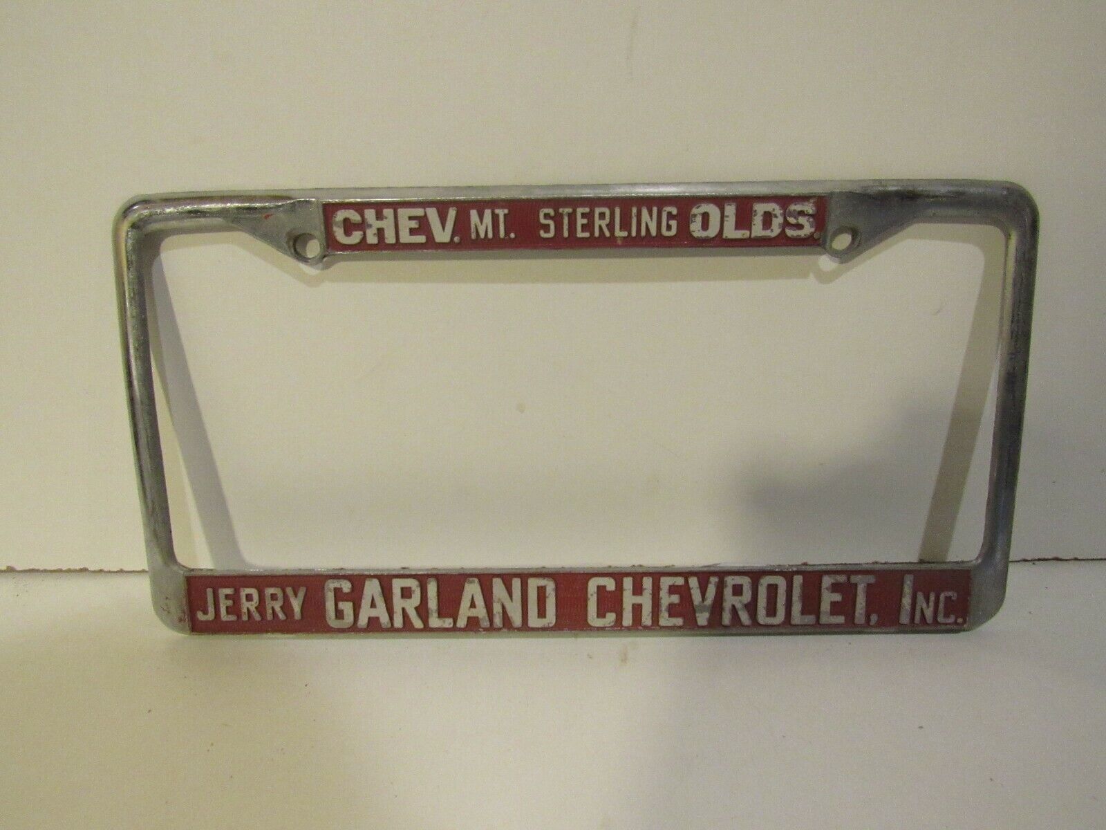 Mt. Sterling Chev Olds Jerry Garland  Dealership Metal License Plate Frame Rare