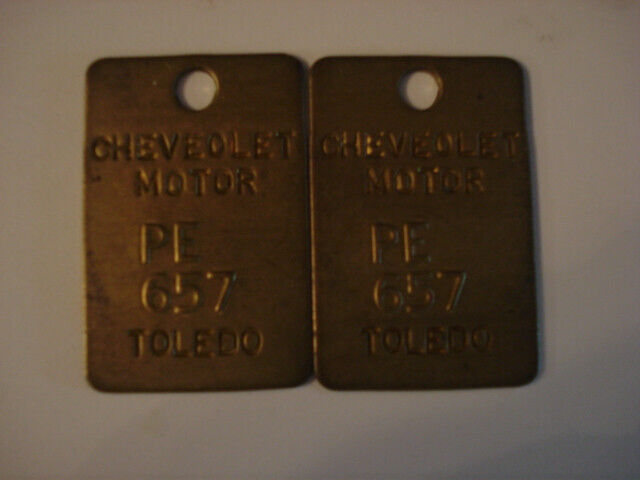 Vintage Pair of Chevrolet Toledo Brass Tool Checks