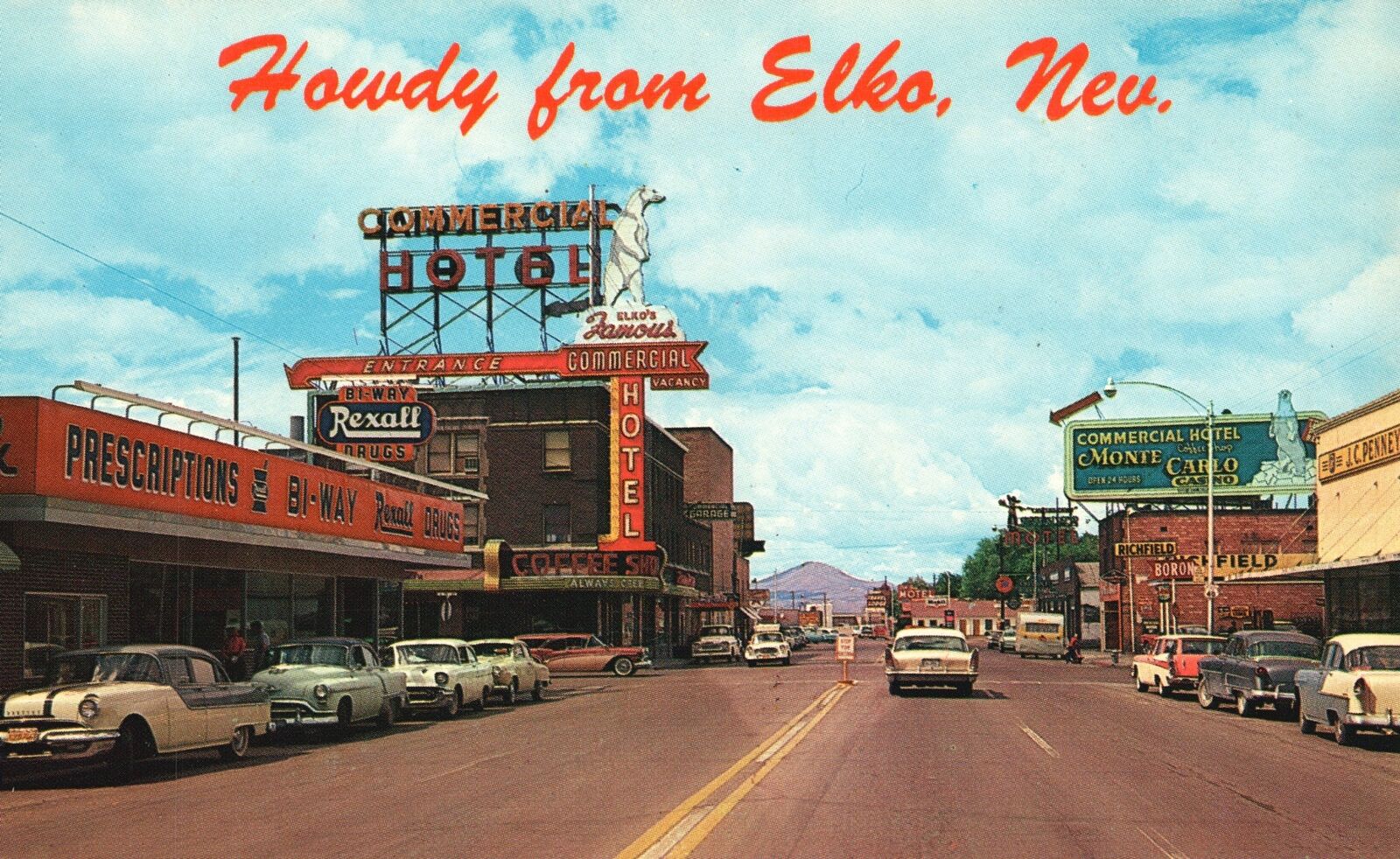 Howdy From Elko Nevada, Commercial Hotel, Rexall Drugs, Cars, Vintage Postcard