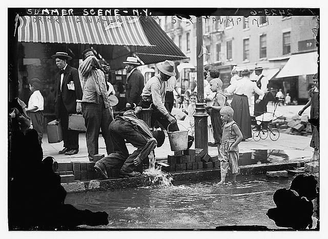 Photo:Summer scene, N.Y. - drinking water from street pump