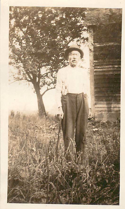 1920s Old Man Walking Cane Hat Suspenders Field Tree Character B&W Photo