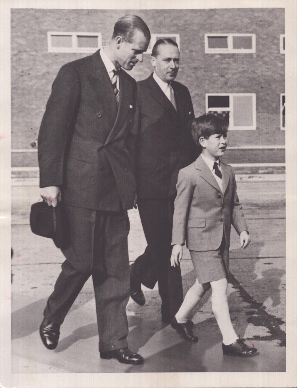 Prince Philip Walks with Young Prince Charles - Press Photo