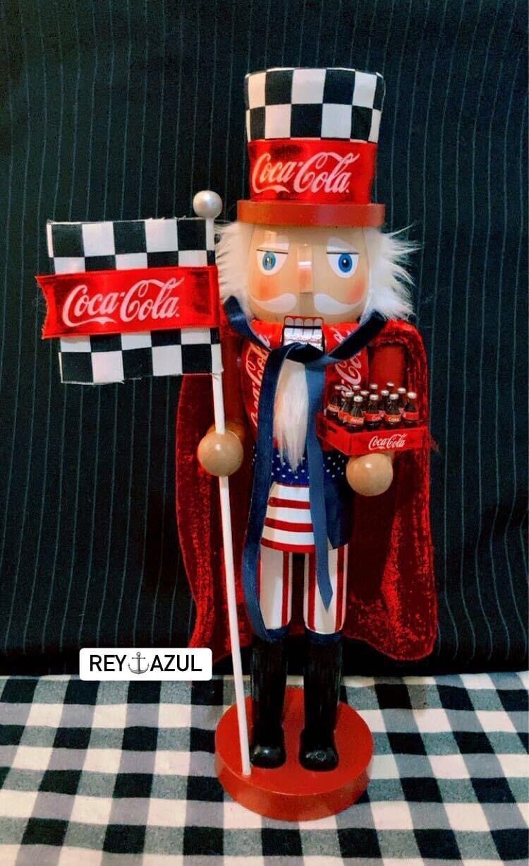 2024 Red COCA-COLA® Nutcracker Checkered 15” With Red Velvet Cape & Red Flag