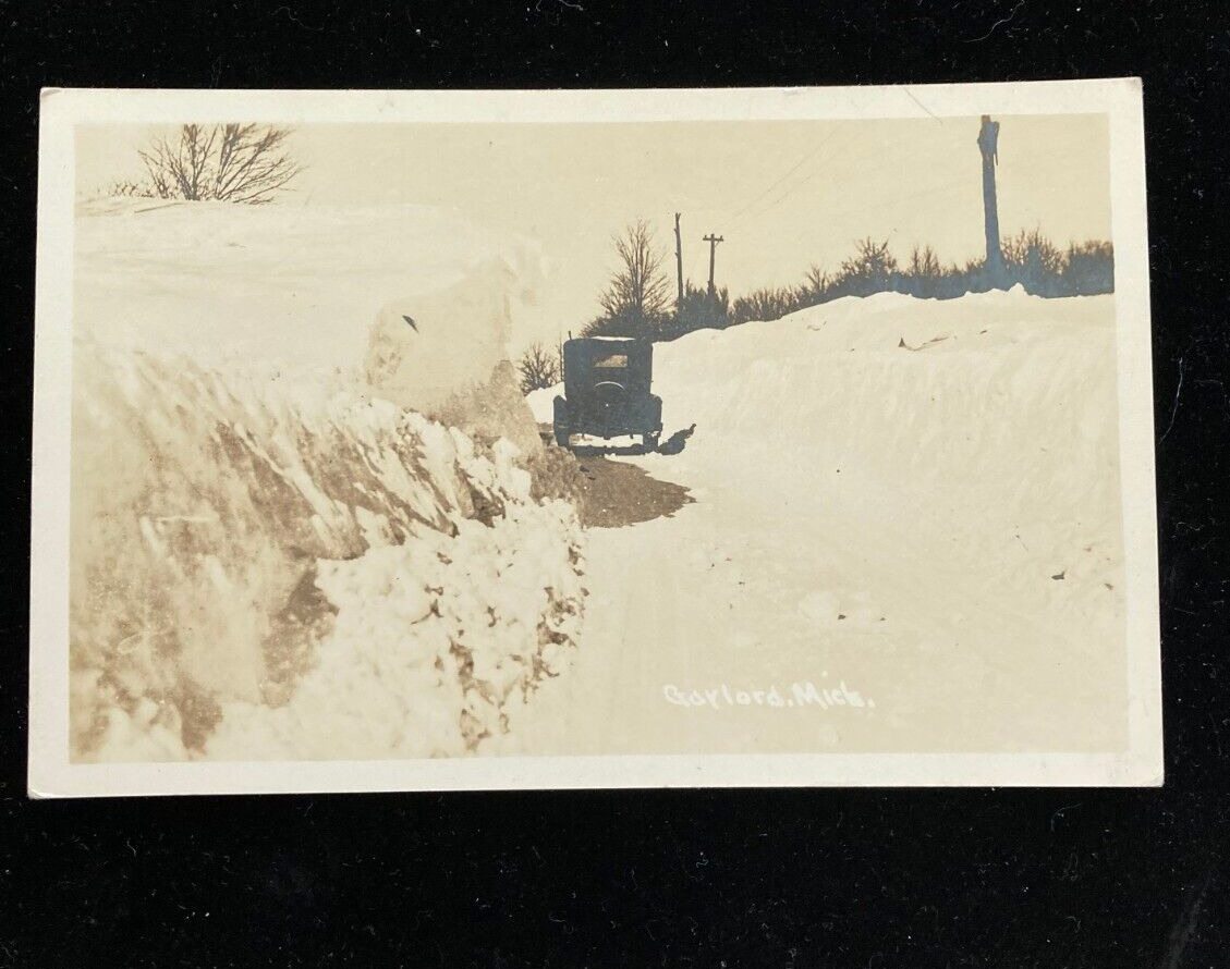 Car In Snow Gaylord Michigan RPPC Postcard