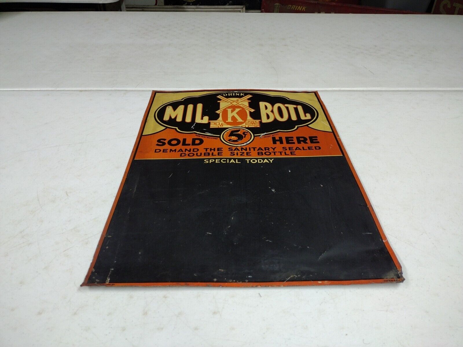 Vintage SST Drink Mil-k-botl Embossed Advertising Windmill Soda Menu Board Sign