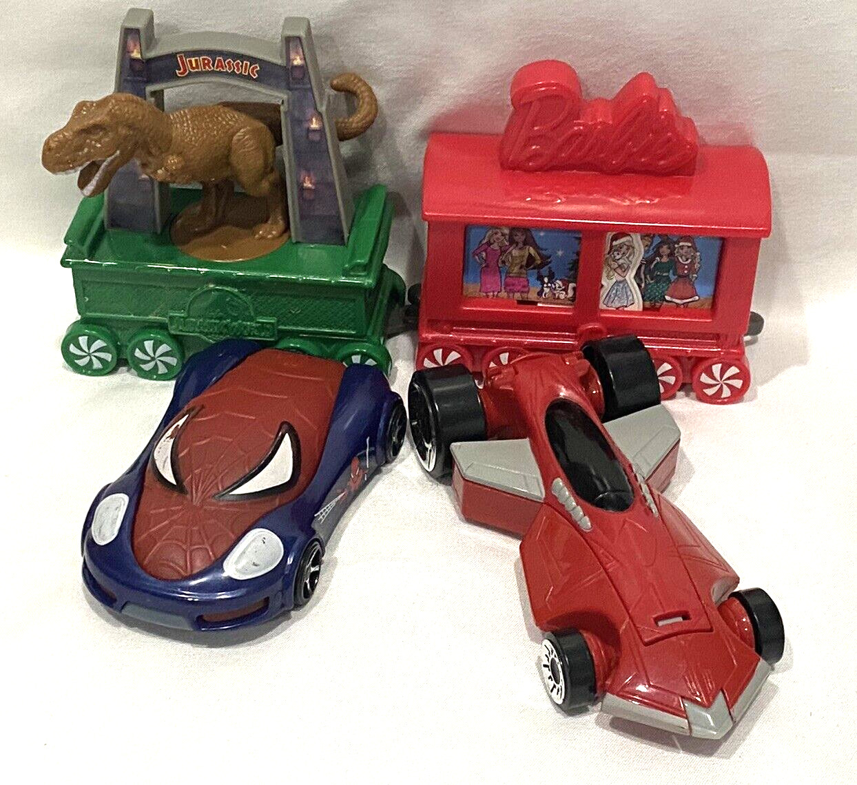 Lot of 4 McDonalds Happy Meal Toys Jurassic World Hot Wheels Spiderman Barbie