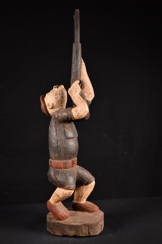 23121  A Primitive  African Yoruba Colonial Hunter Statue Nigeria