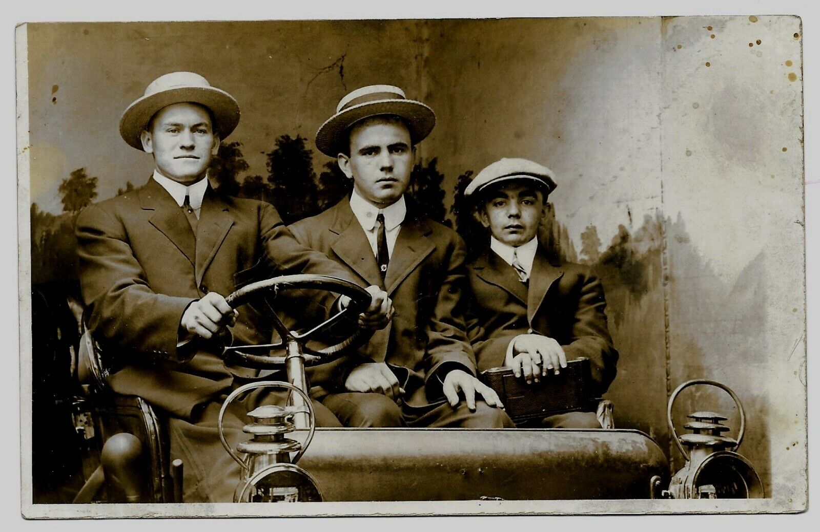 Three Funny Looking Guys in Studio Car Real Photo Postcard c. 1905