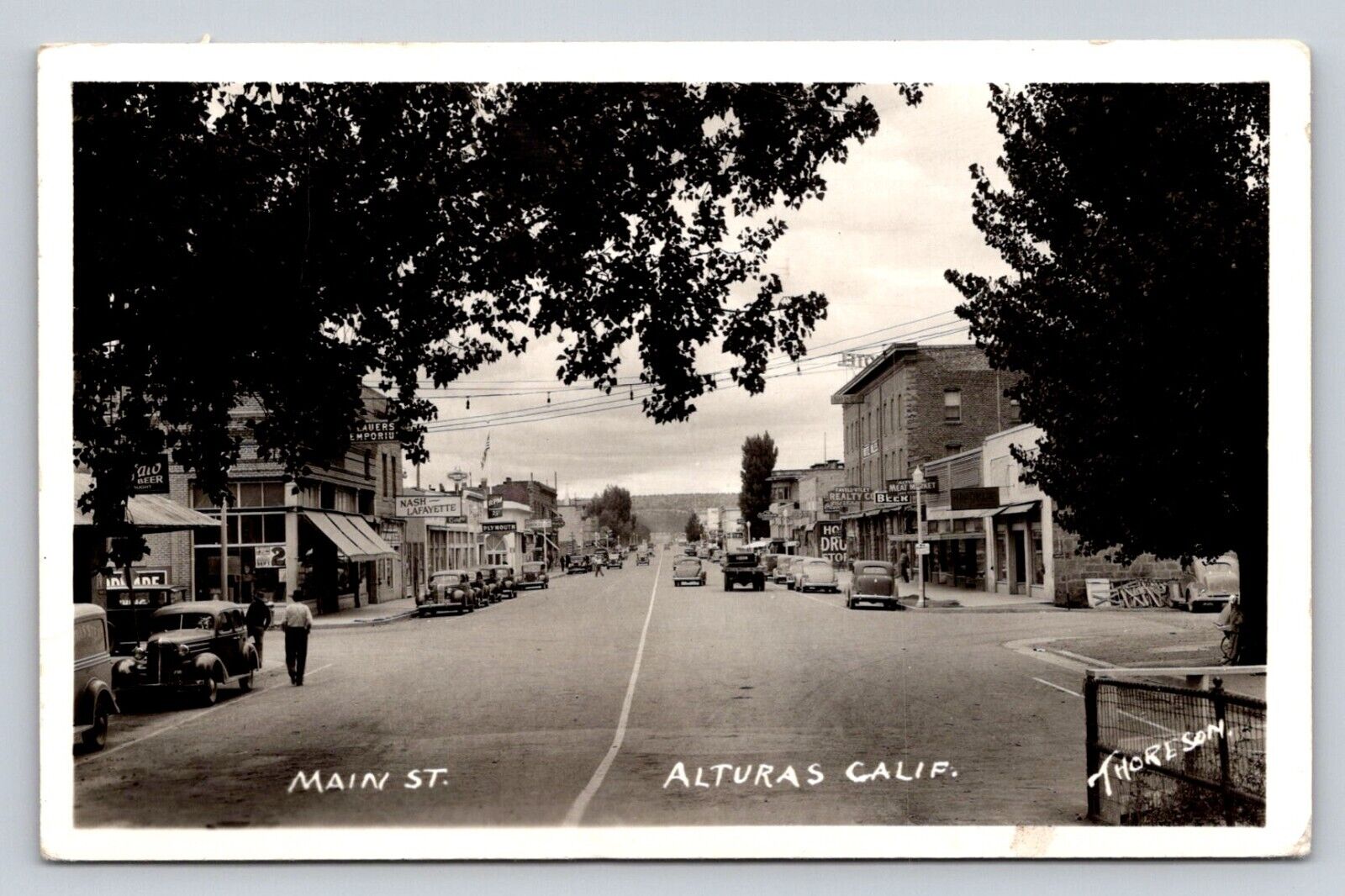 c1930s RPPC Main Street Cars Signs Thoreson Alturas California Real Photo P321A