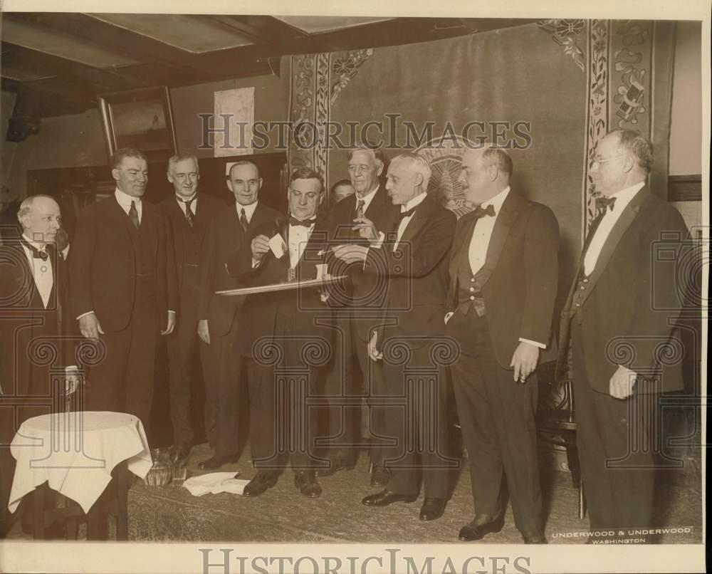 1925 Press Photo Secretary of the Treasury Mellon burns a $5,000 mortgage paper