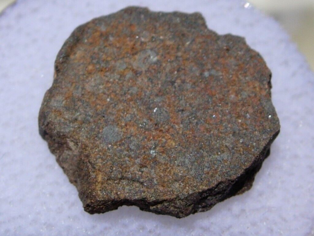 1.29 grams NWA 6332 Meteorite (H5) with Total Known Weight of 263 grams