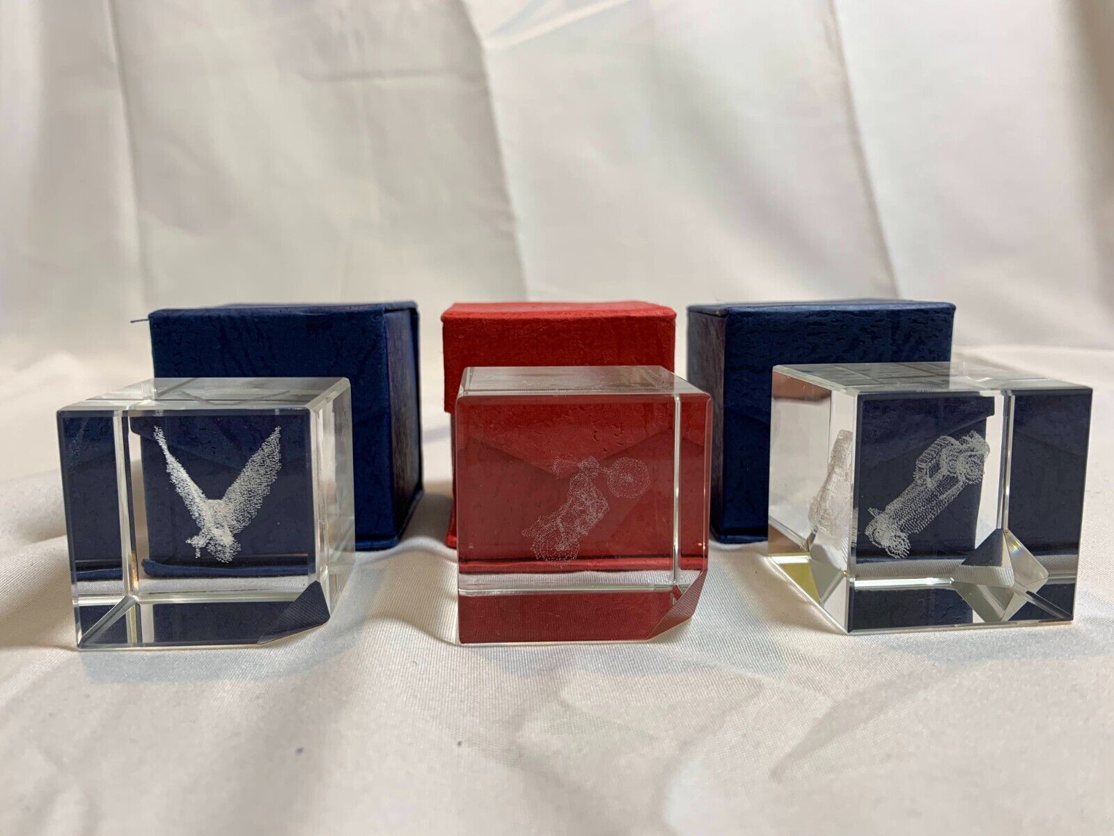 Set of Three Acrylic paperweights with embedded Holygrams and Gift Boxes