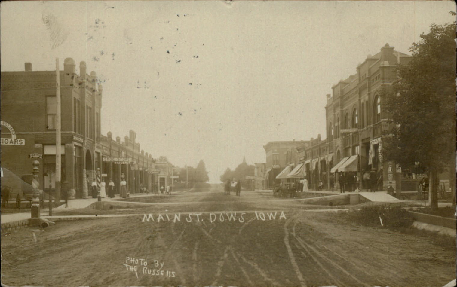 RPPC Dows Iowa Main Street Cigars 1909 to Black River NY real photo postcard