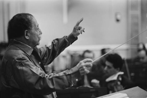French conductor Pierre Monteux pictured conducting an orchestra du - Old Photo