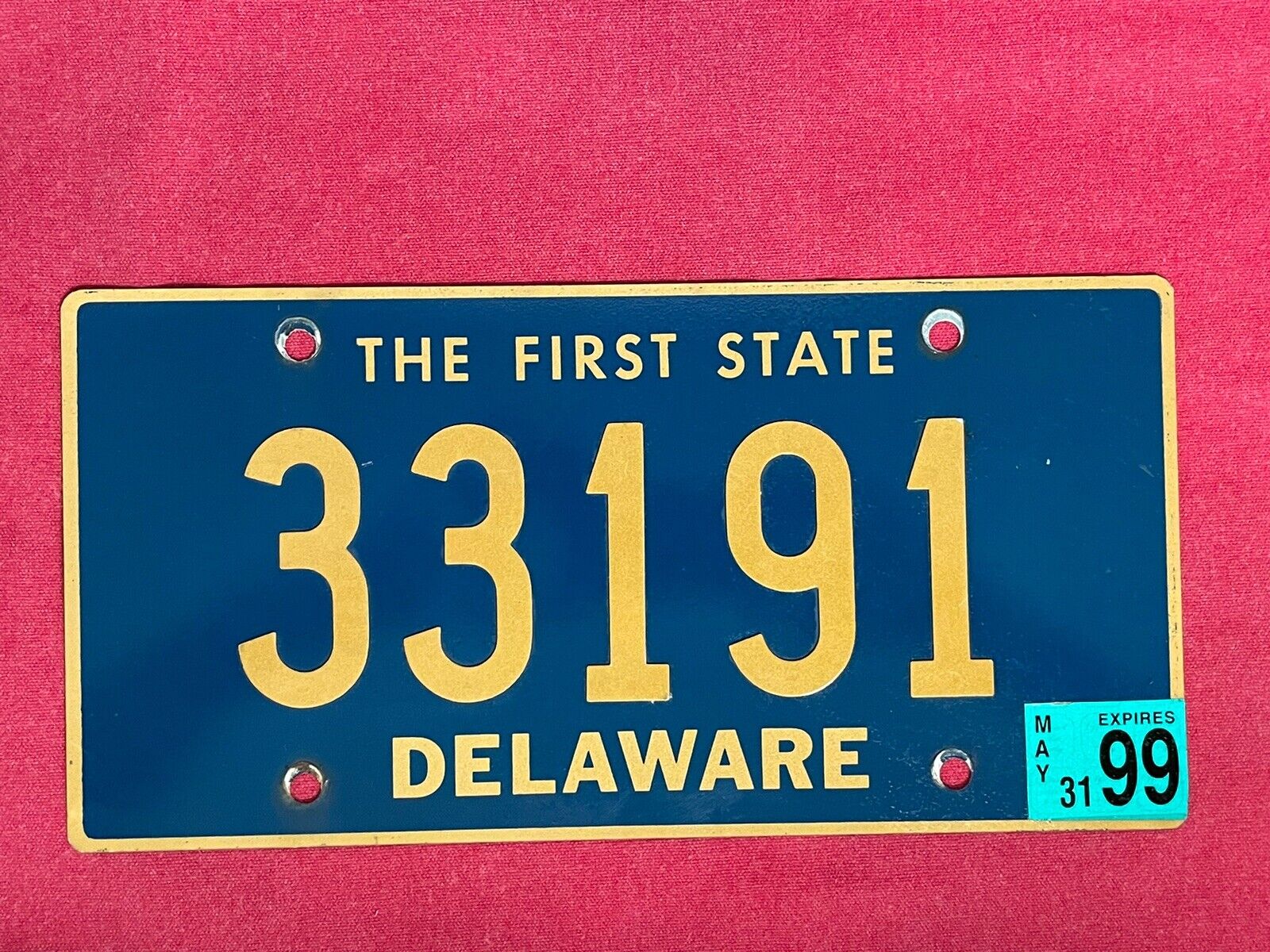 Vintage Delaware 5-digit License Plate with 1999 Expiration and Riveted Numbers