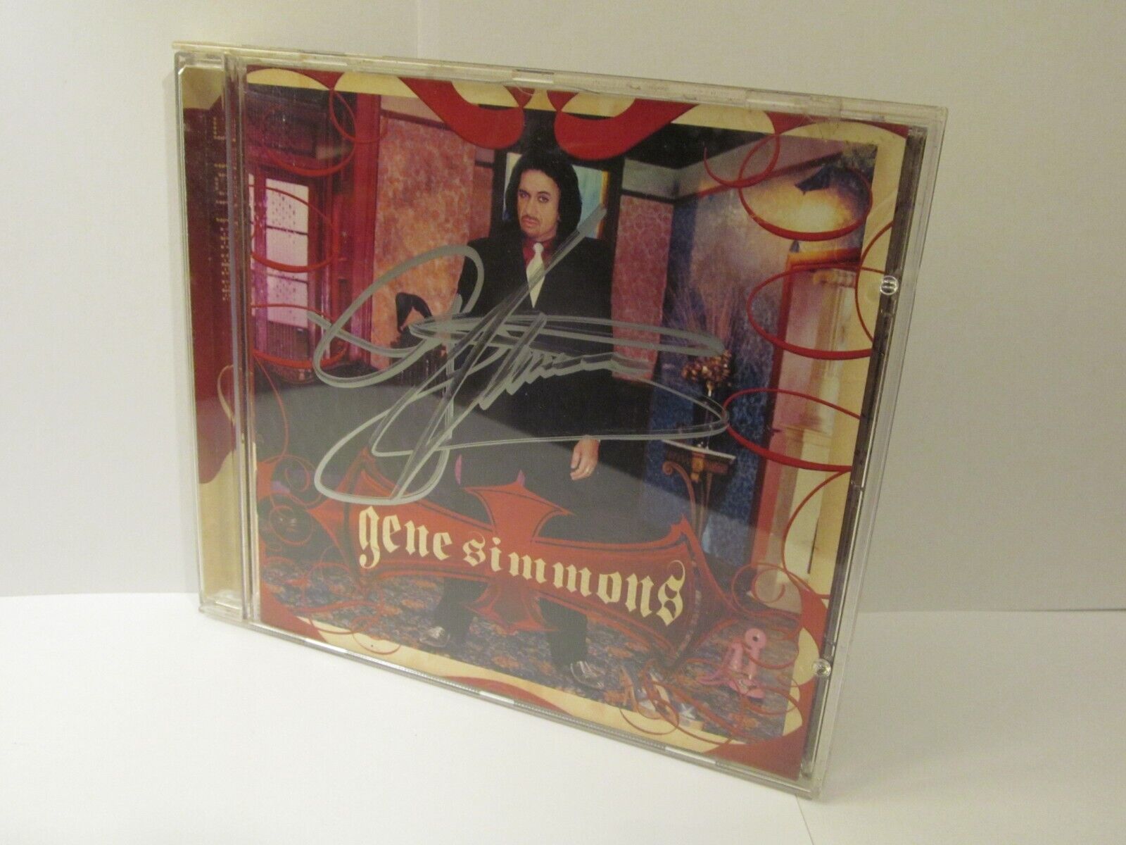 GENE SIMMONS ASSHOLE CD SIGNED AUTOGRAPHED SILVER SHARIE ON FRONT U.S. PRESS