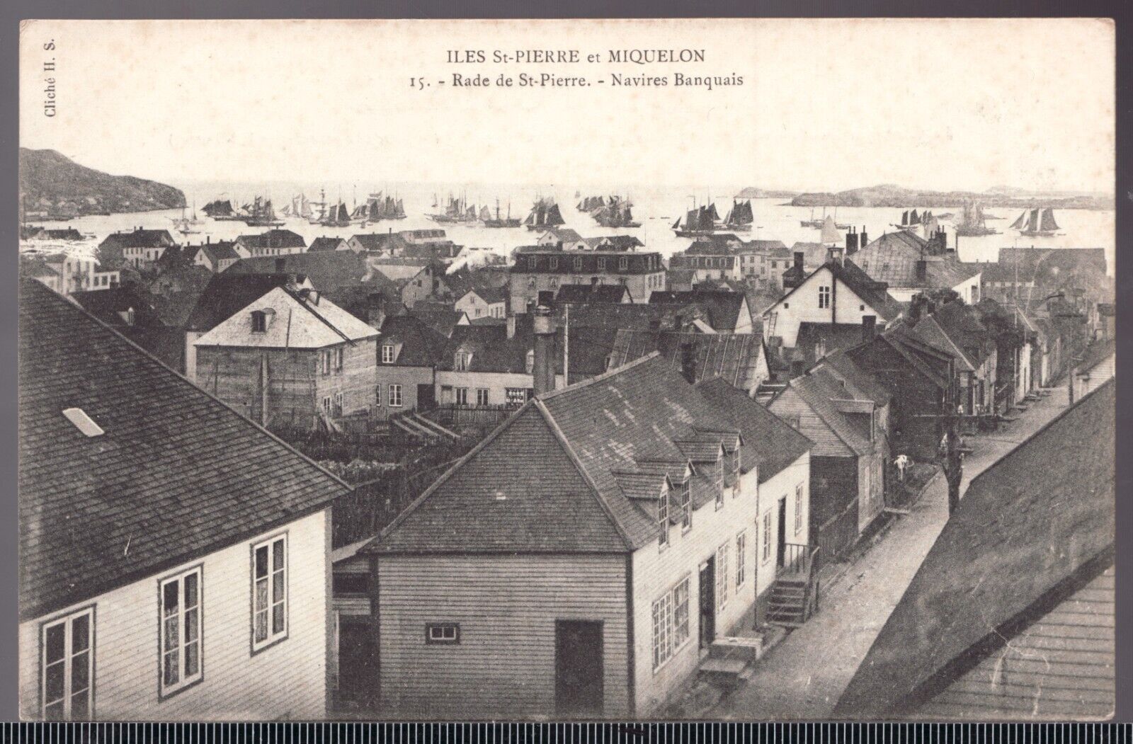 c.1910 Postcard - unposted - St-Pierre et Miquelon view of town & tall ships