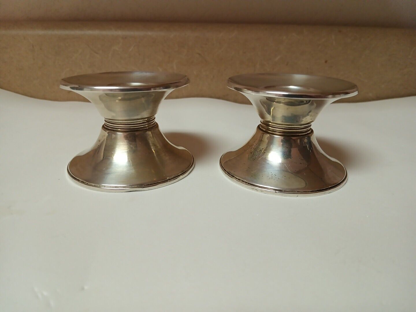 A pair of Gorham Sterling Silver Candle Holders Sterling Cement Reinforced 790