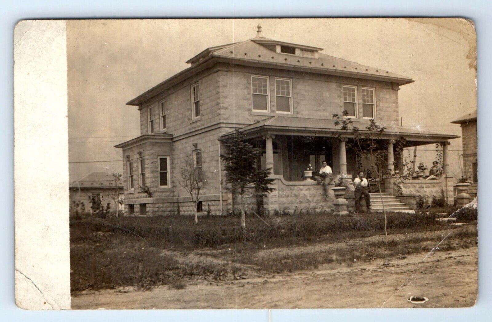 Family Sitting on Front Porch Smoking Portrait Early America RPPC Postcard c1910