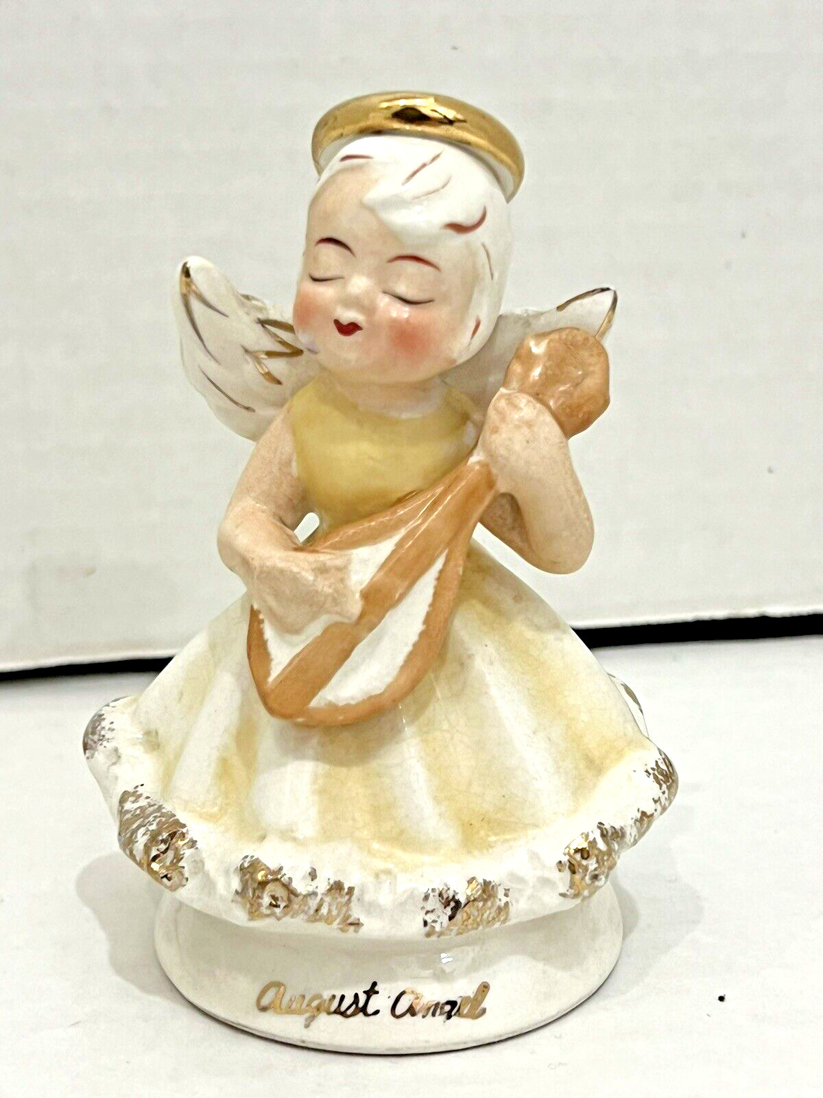 Vintage August Angel Playing Instrument Figurine