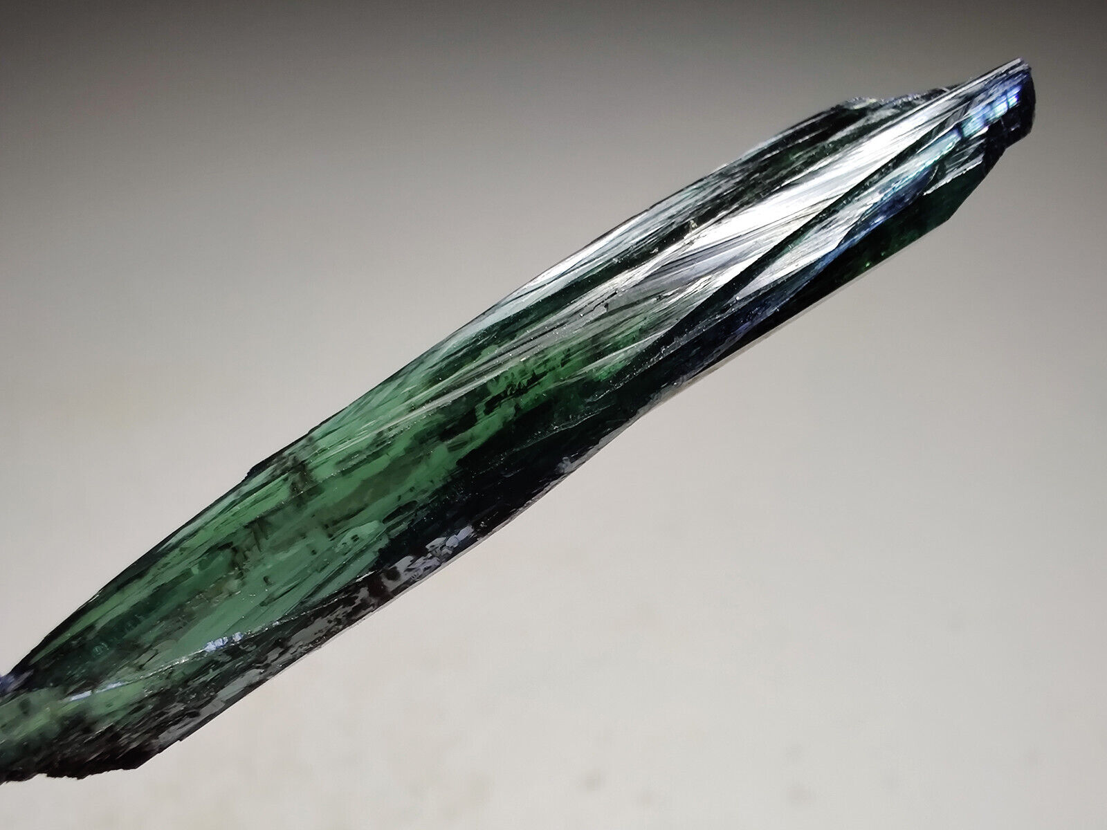 Vivianite crystal. From Amazonas, Brazil. 6 cm. Video.