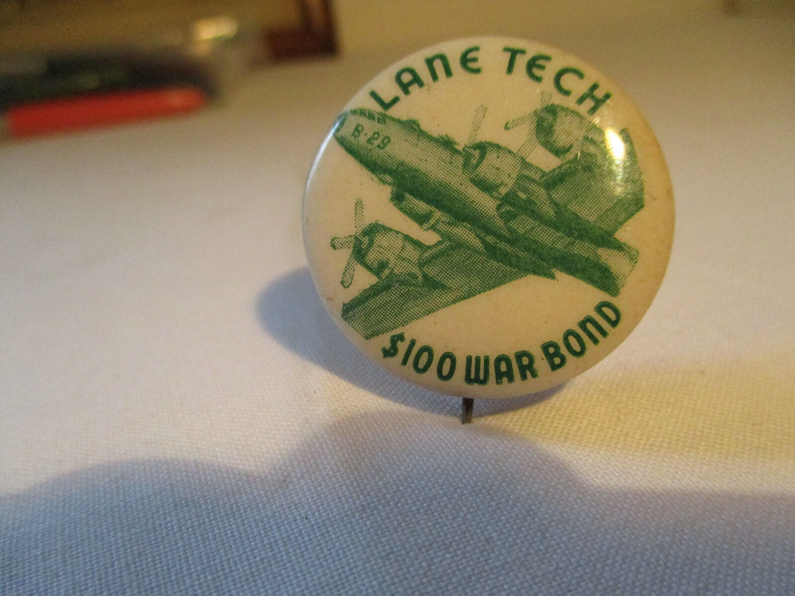  WWII $100 WAR BOND PINBACK W/ B29 SUPER FORTRESS BOMBER FROM LANE TECH CHICAGO