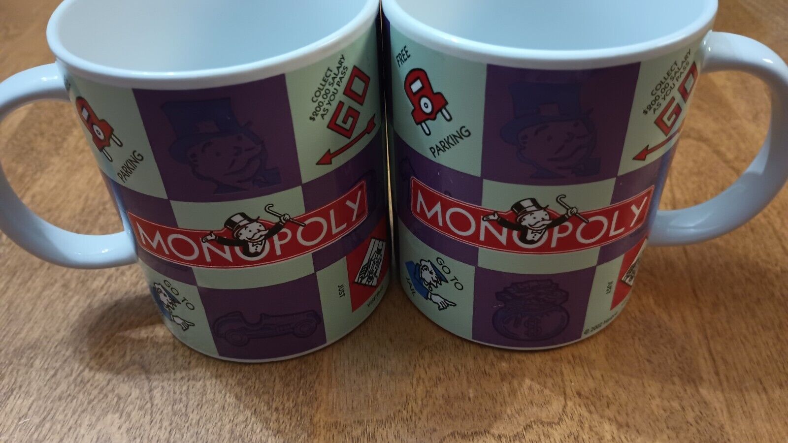 VTG, 2002 pair of Monopoly Coffee Mugs, Sherwood Brands of RI, INC. Excellent co