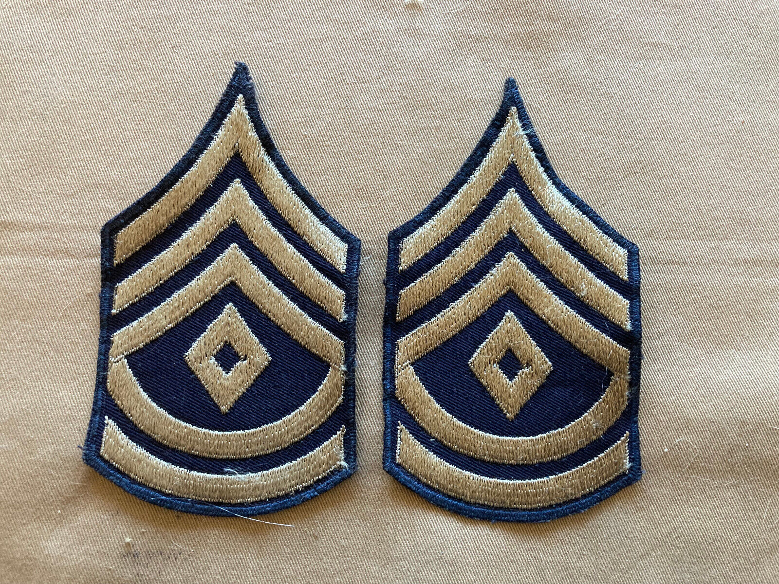 HTF 1941-43 First Sergeant chevron pair on bordered twill from collection