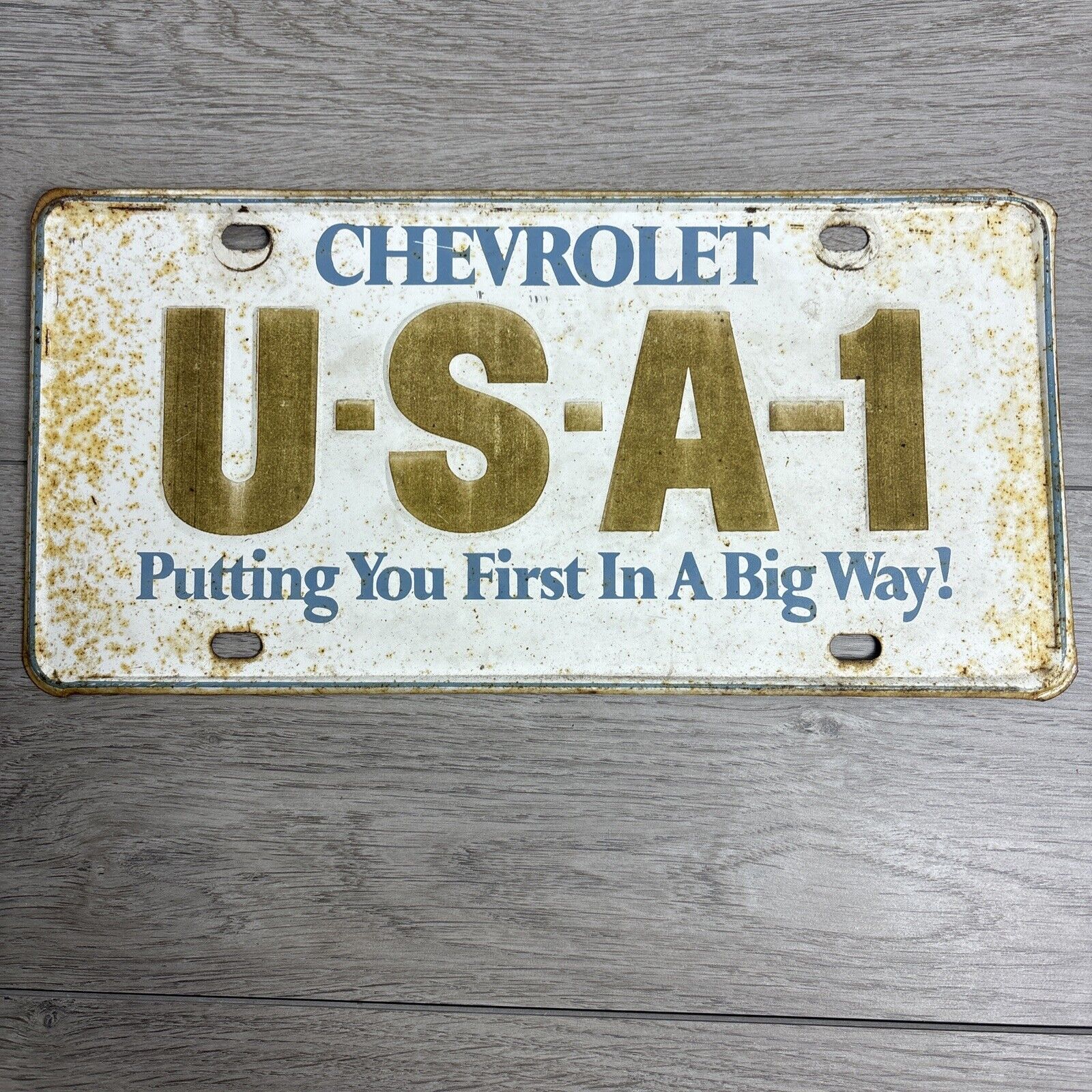 Vintage License Plate  USA-1 Chevrolet (Putting You First...) Metal