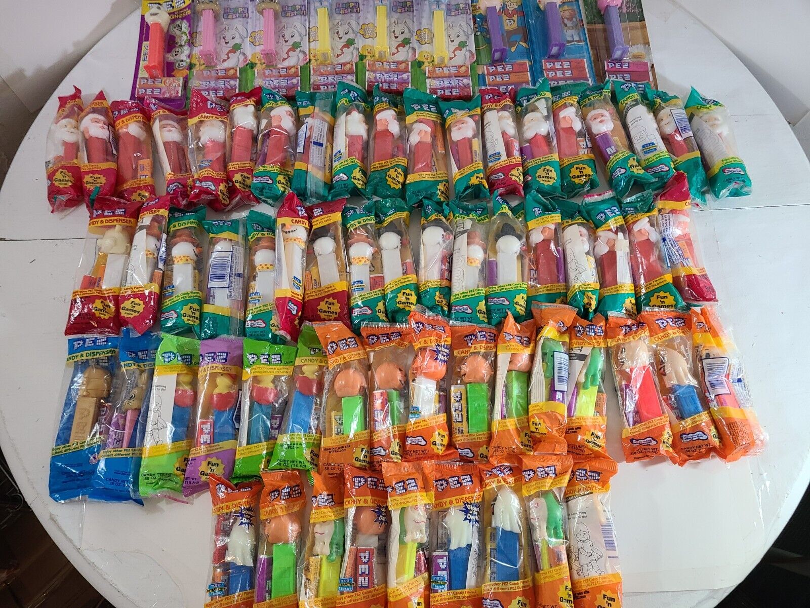 70 lot of PEZ Seasons, a Tin, Halloween, Easter, X-Mas, all Brand New and Sealed
