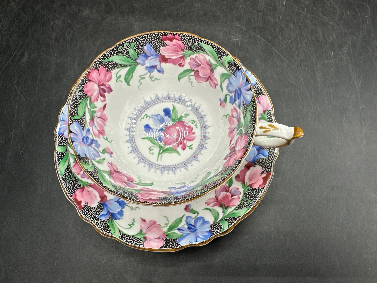PARAGON SWEET PEA CUP AND SAUCER HM THE QUEEN