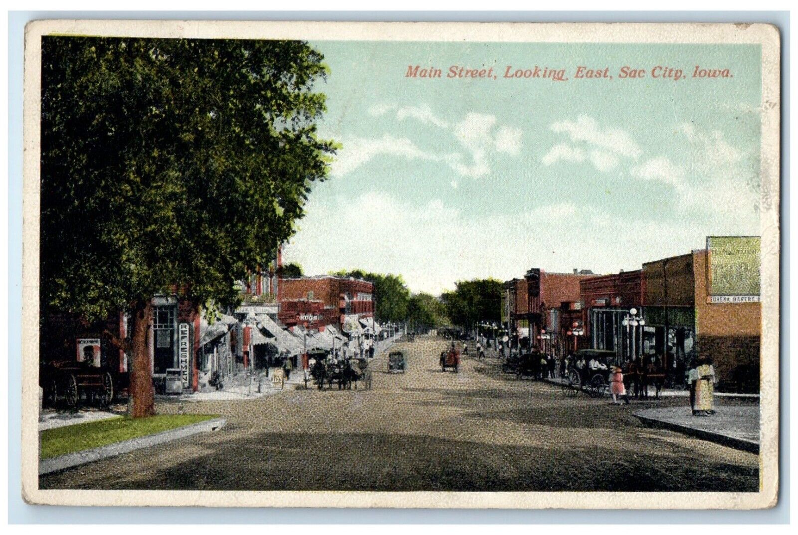 c1910 Main Street Looking East Exterior Store Building Sac City Iowa IA Postcard
