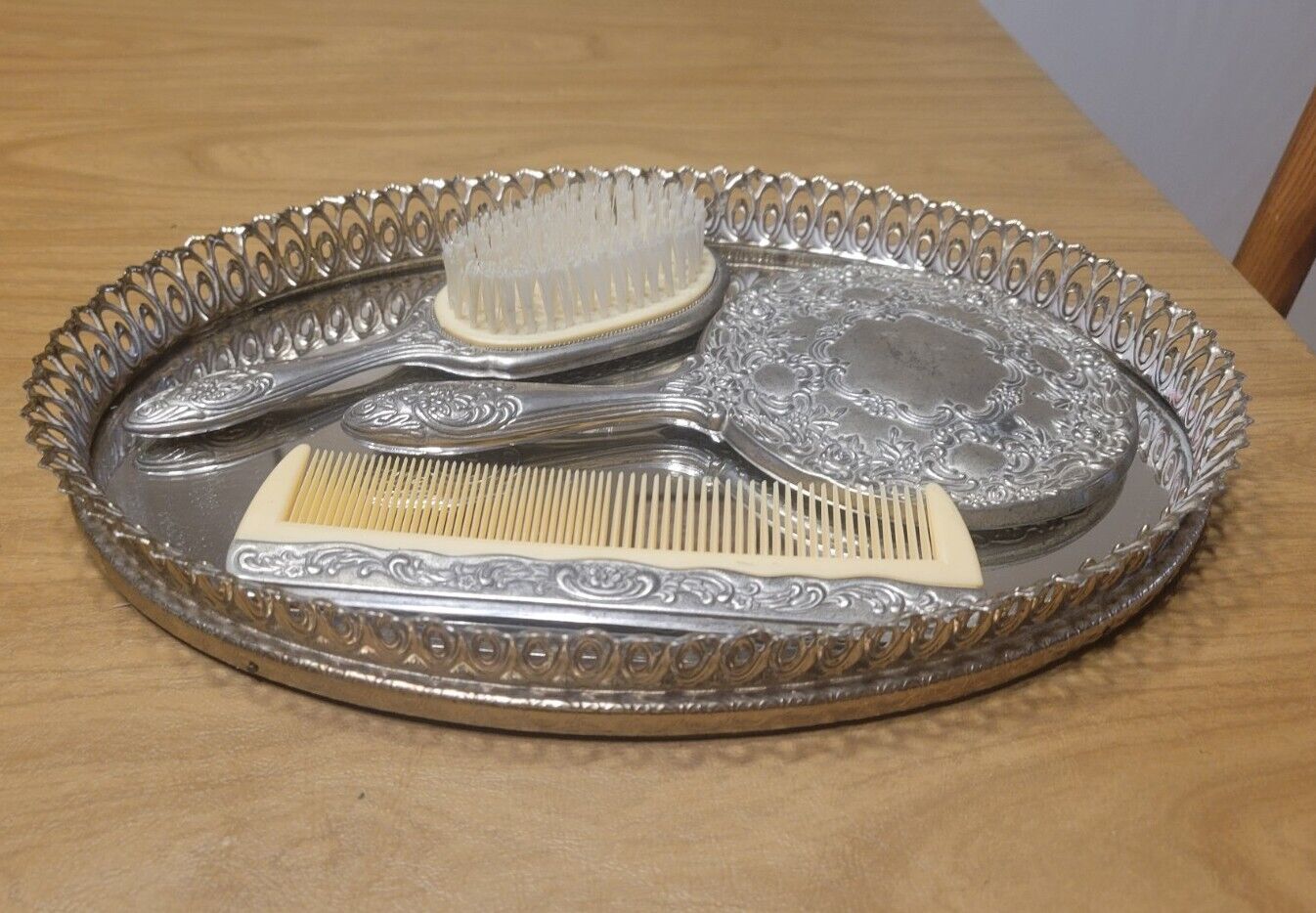 4 piece Silver 1960s Chrome Vanity Set Comb Brush Mirror