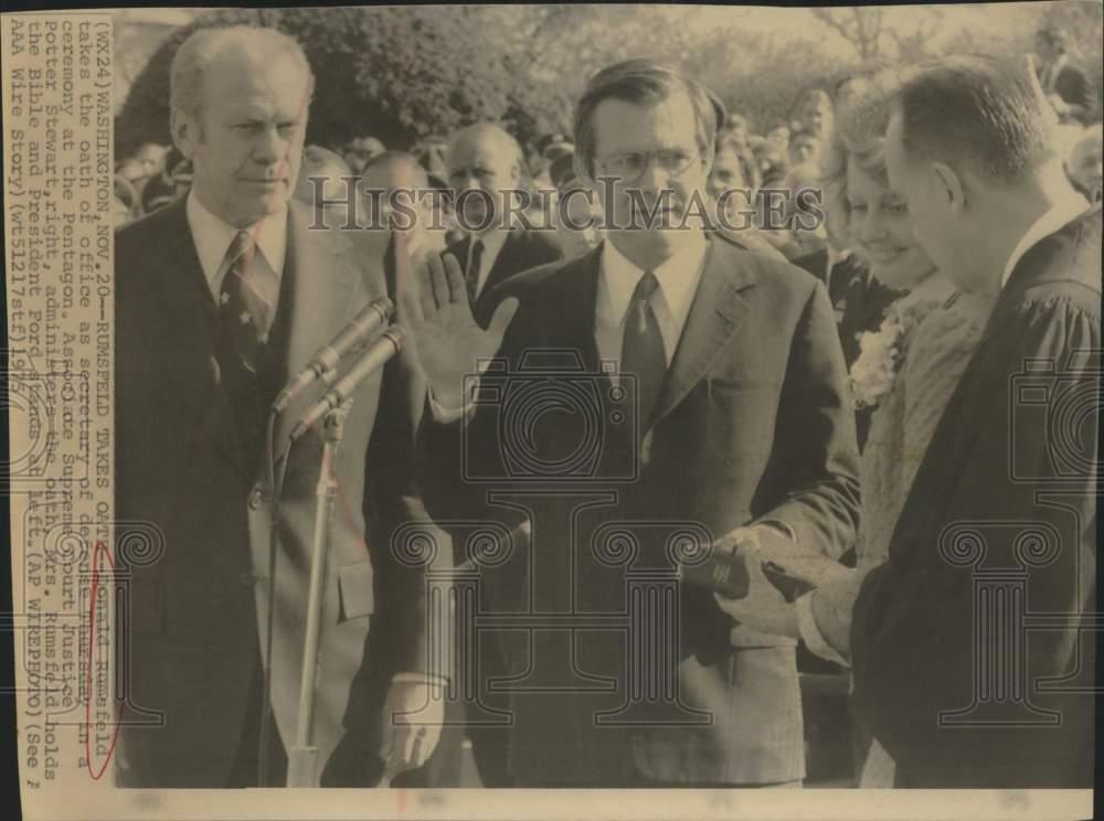 1975 Press Photo Donald Rumsfeld taking oath of office in Washington - saa28786