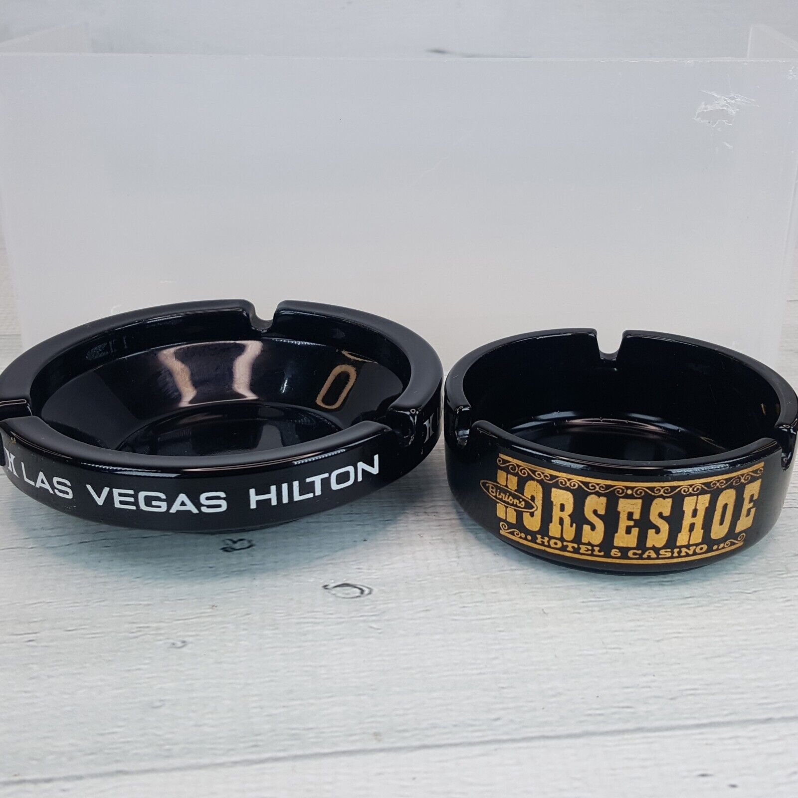 Vintage Set of 2 Las Vegas Nevada Black Glass Ashtrays Hilton & Horseshoe Casino
