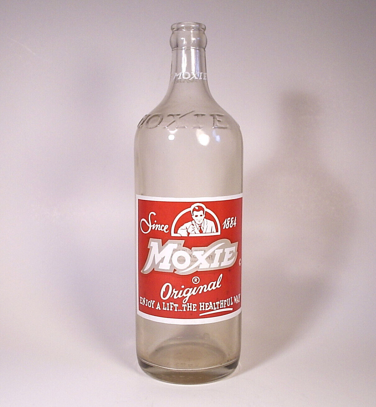 MOXIE Embossed 1 Pint 10 oz Soda Pop Bottle Needham Heights MASS Boston