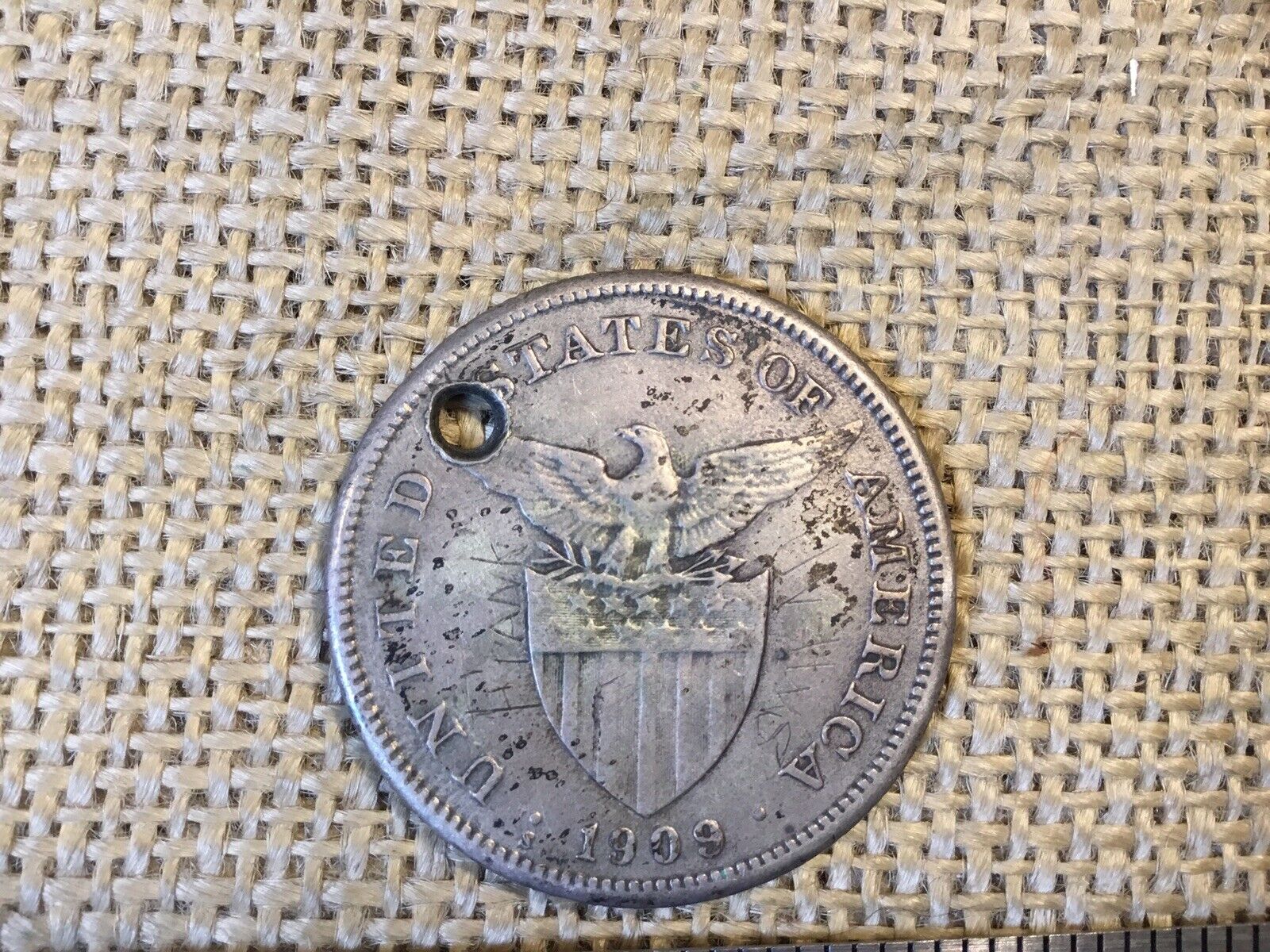 ORIGINAL US 1909 ONE PESO COIN CARRIED BY USN VETERAN WITH HIS NAME SCRATCHED ON
