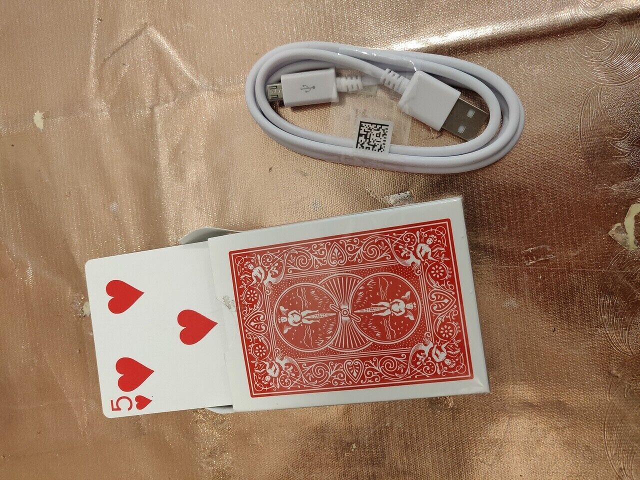Electronic rising card magic trick