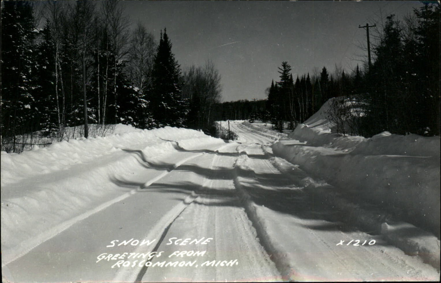 RPPC Roscommon Michigan snow covered road 1955 real photo postcard