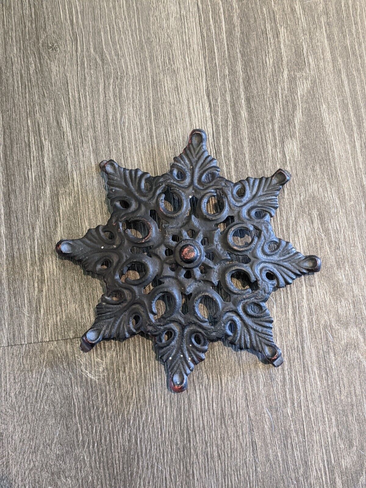 Antique cast iron star flower art deco