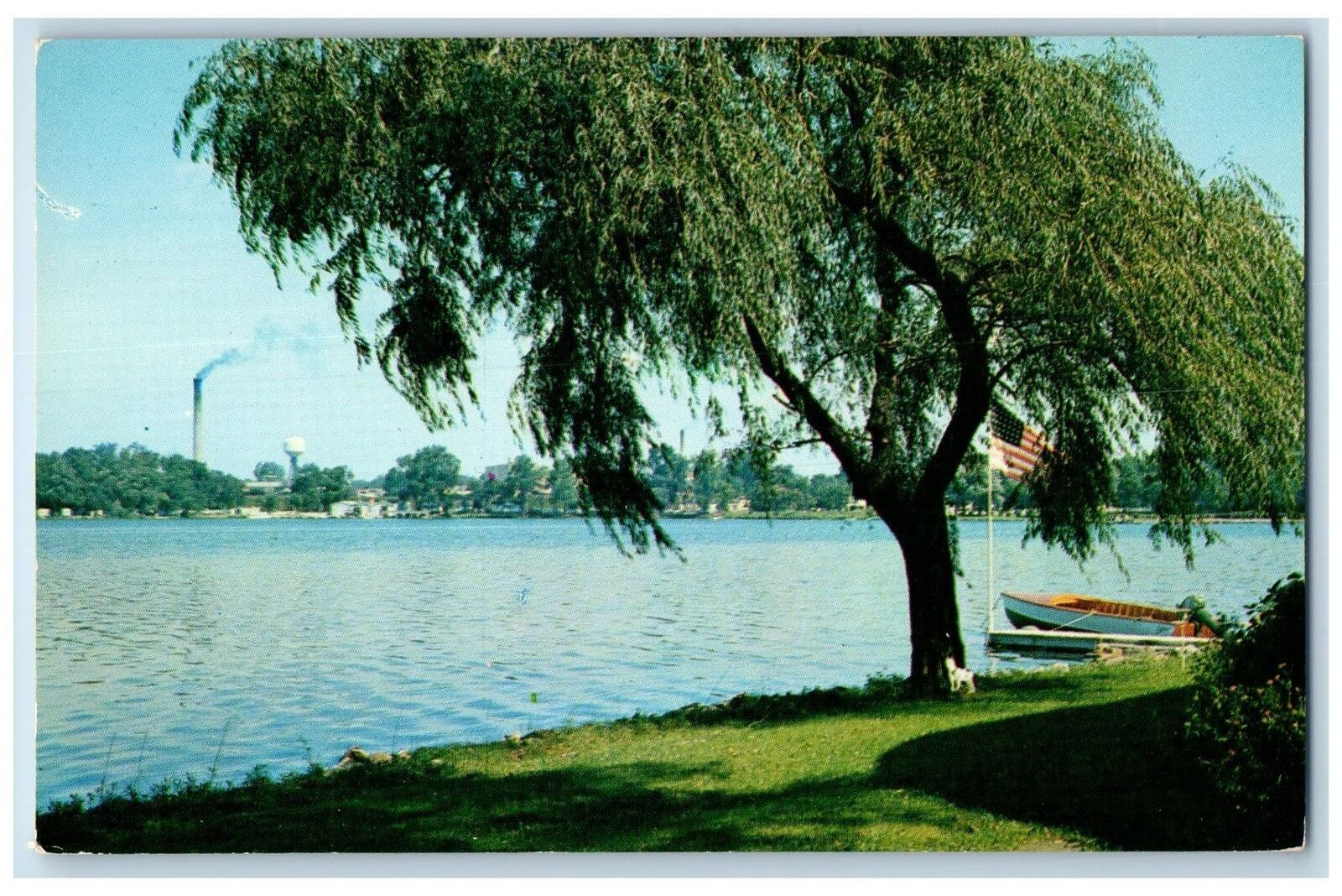 Warsaw Indiana IN Postcard Lake Winona Trees Canoe Boat Flag c1960's Vintage