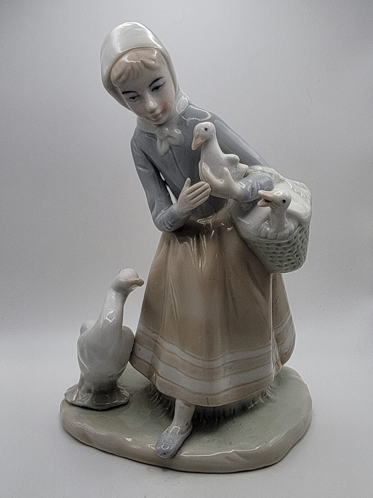 Vintage Porcelain Woman and Geese Figurine 9.5\