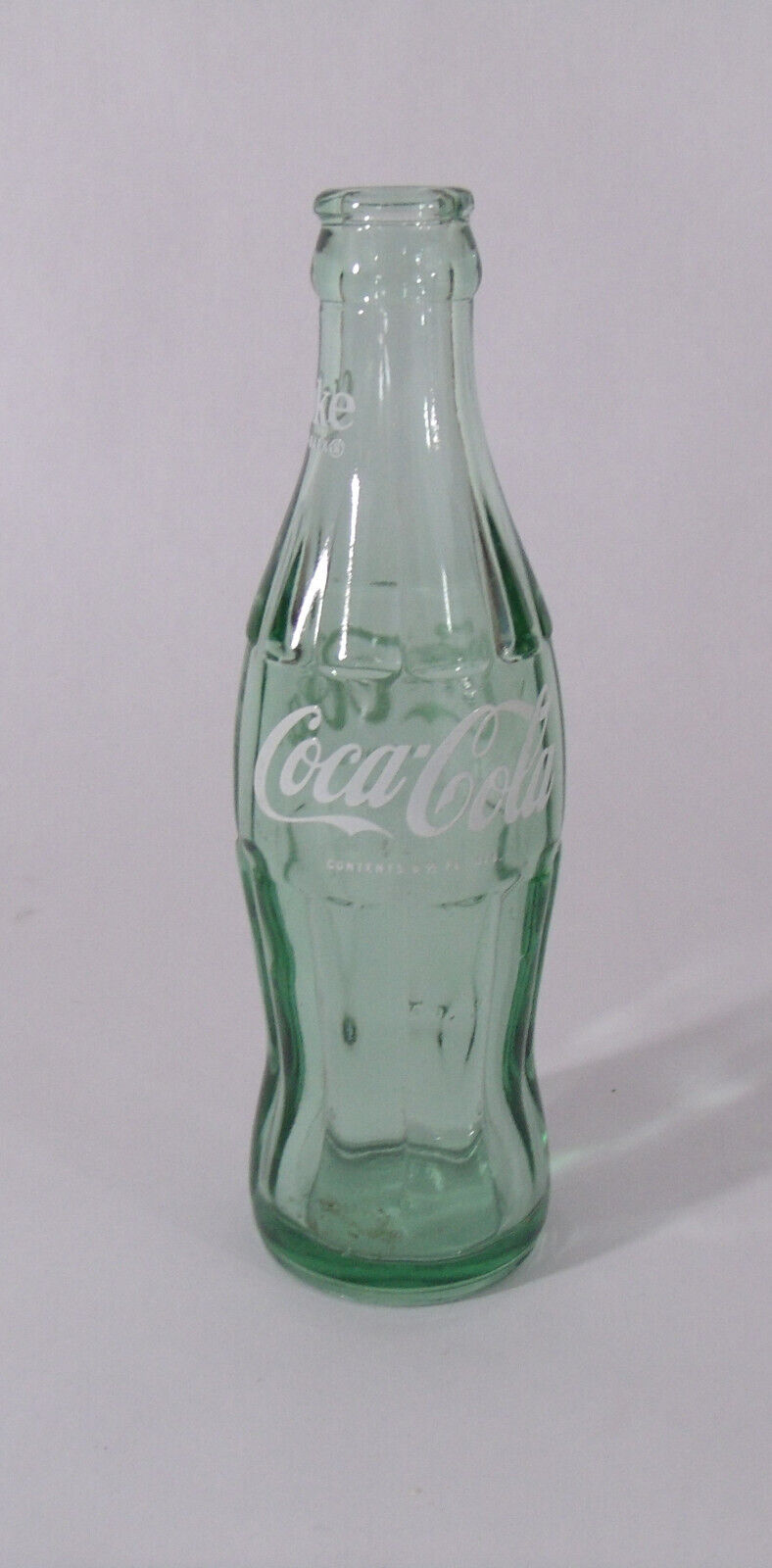 4 Vintage Coke Bottles lot