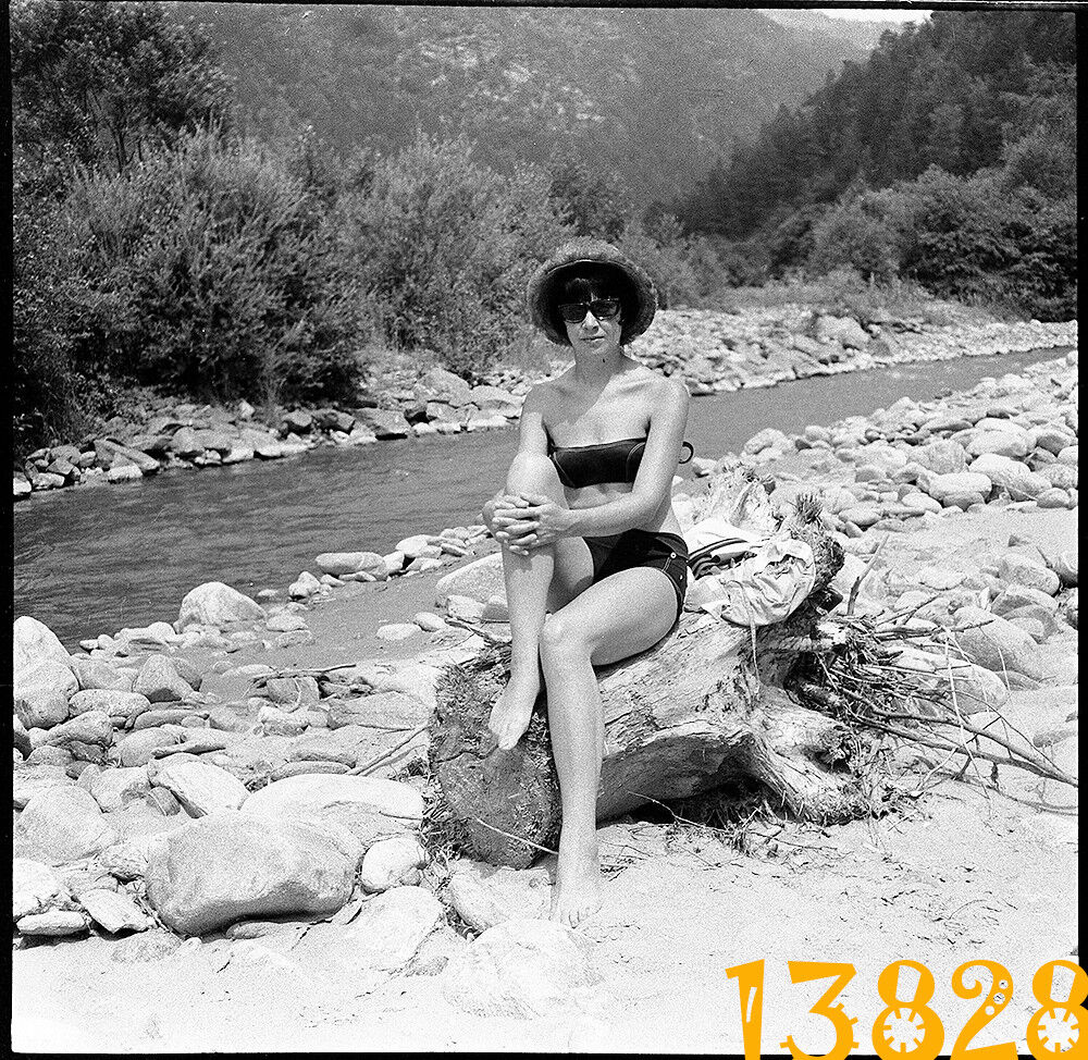 vintage negative sexy woman at riverside, modern swimsuit 1960's  