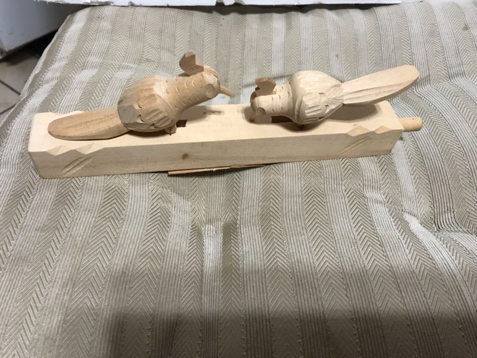 Russian hand carved animated wooden toy, woodpeckers pecking
