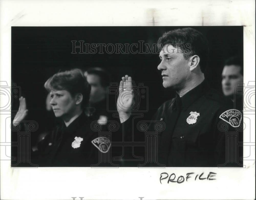 1990 Media Photo Police officer Michael Dupont sworn in by Mayor White