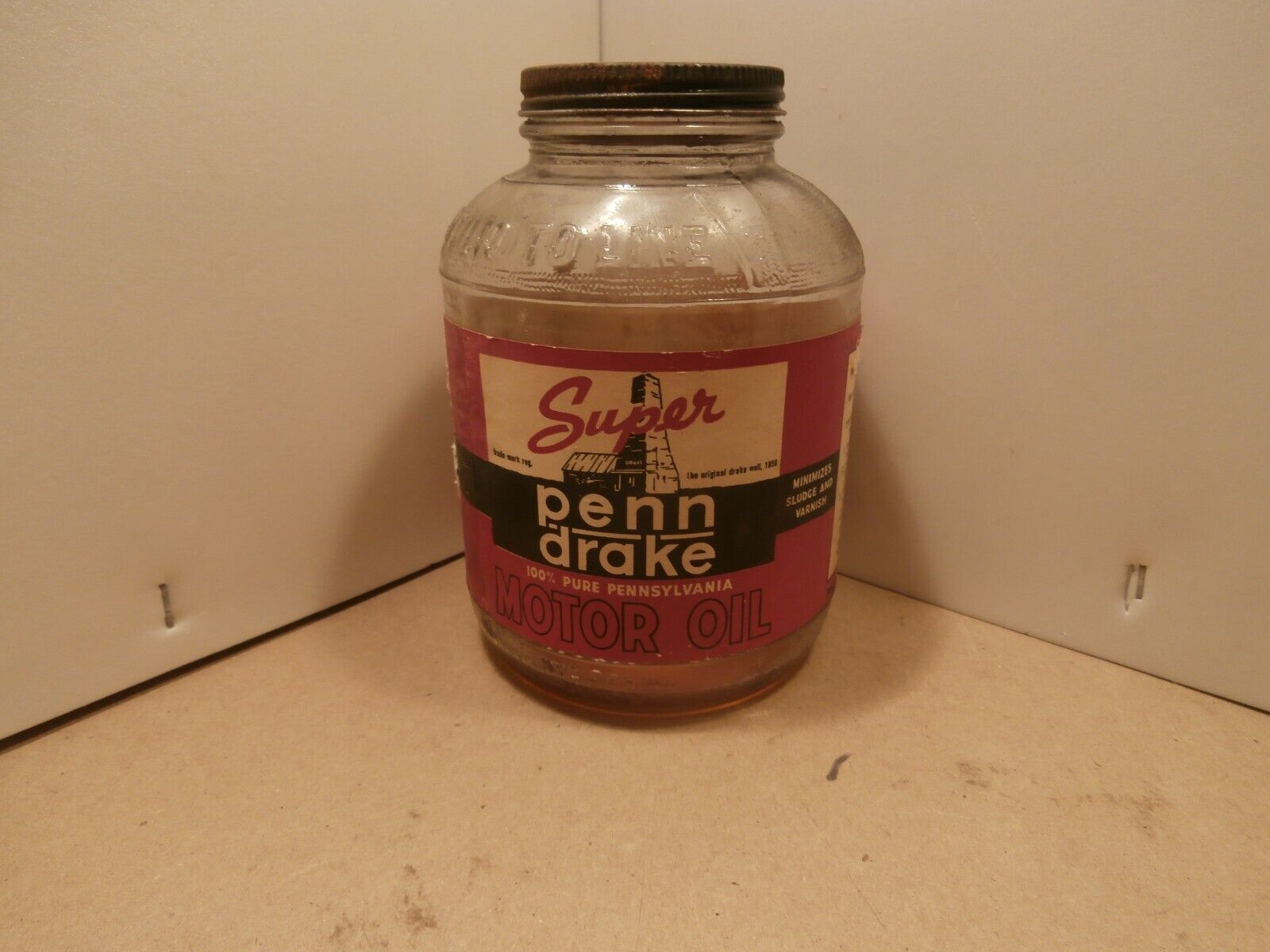 Vintage Penn Drake motor oil bottle , Super Pure Pennsylvania oil sign