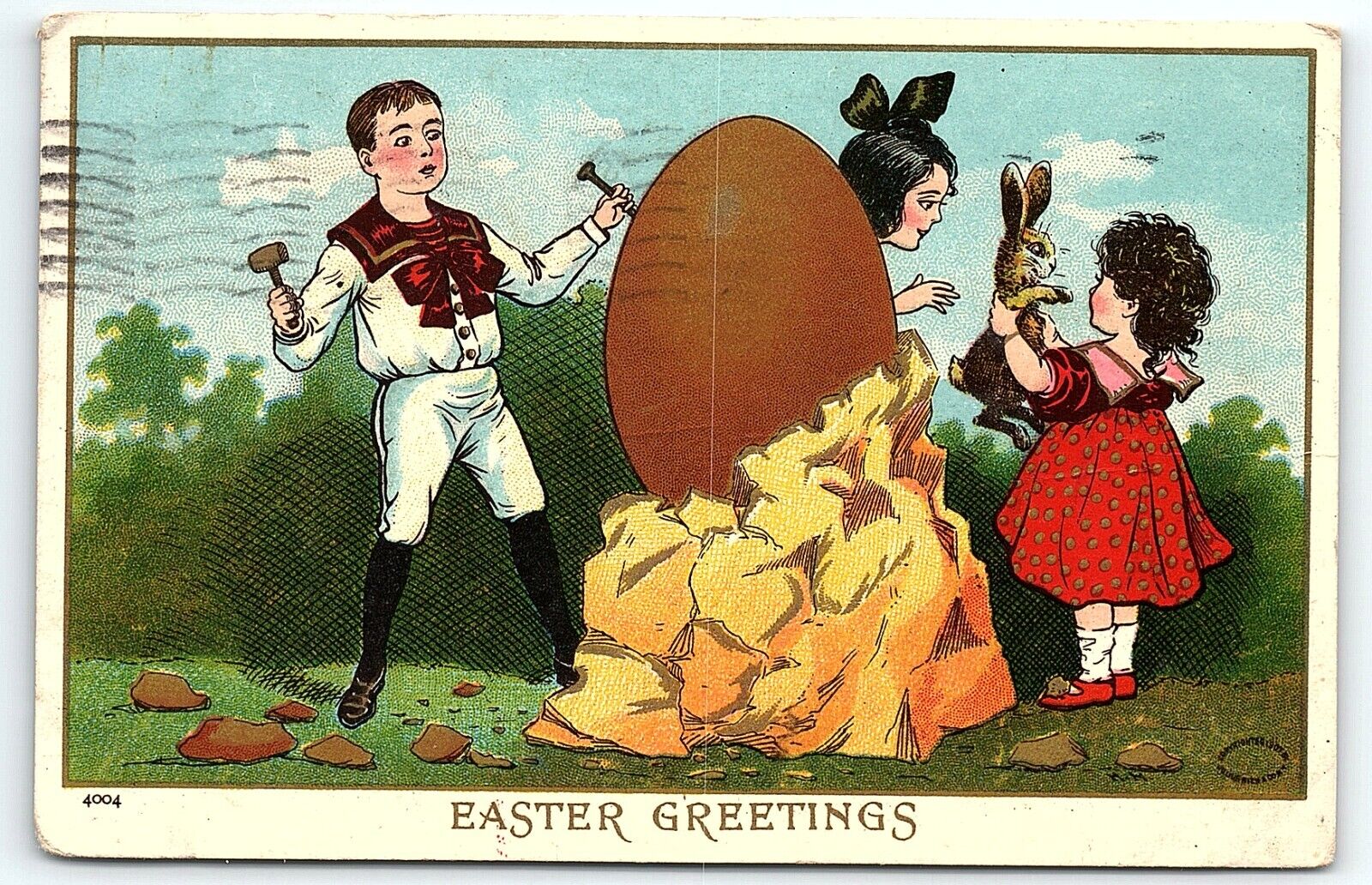 1909 EASTER GREETINGS CHILDREN CHISELING OUT EASTER EGG RABBIT POSTCARD P2515